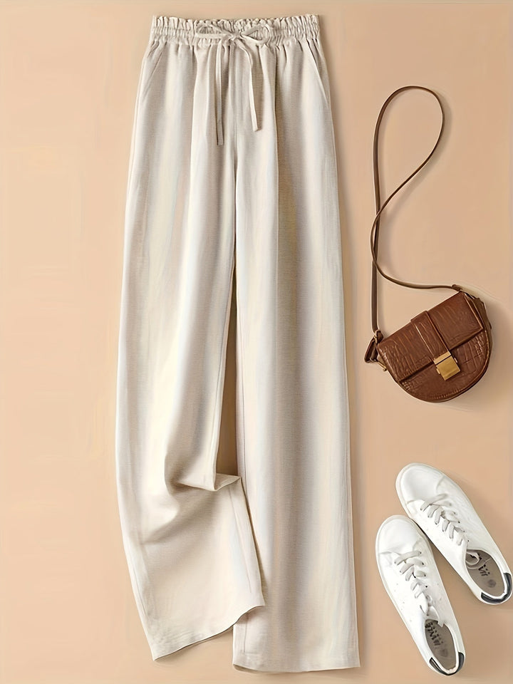 Pantaloni donna a vita alta casual con coulisse, perfetti per un look estivo e comodo in lino.