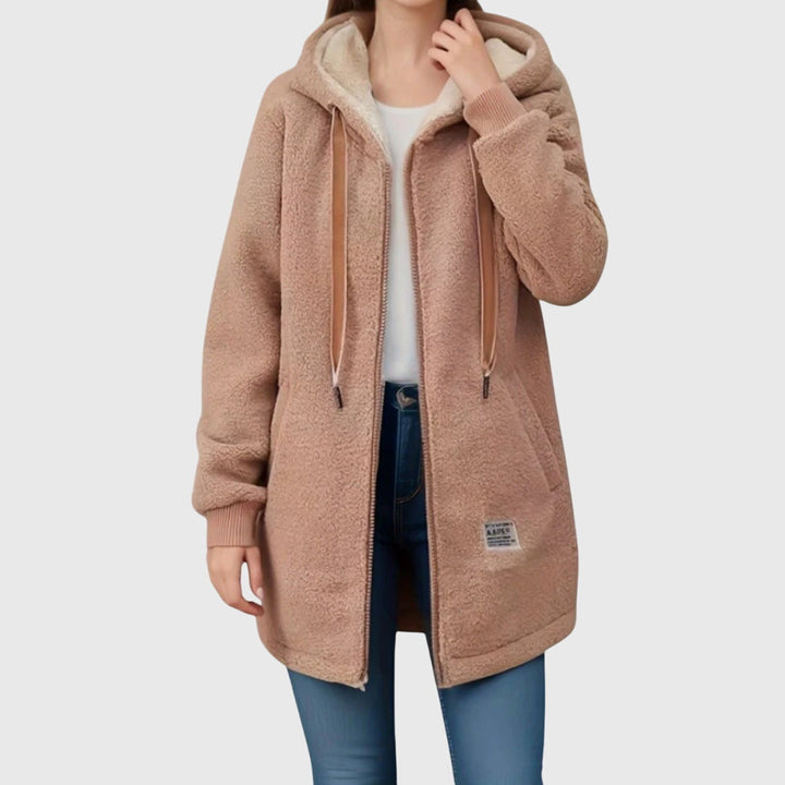 Morbida giacca in pile da donna con cappuccio per comfort casual. Perfetta per il freddo.