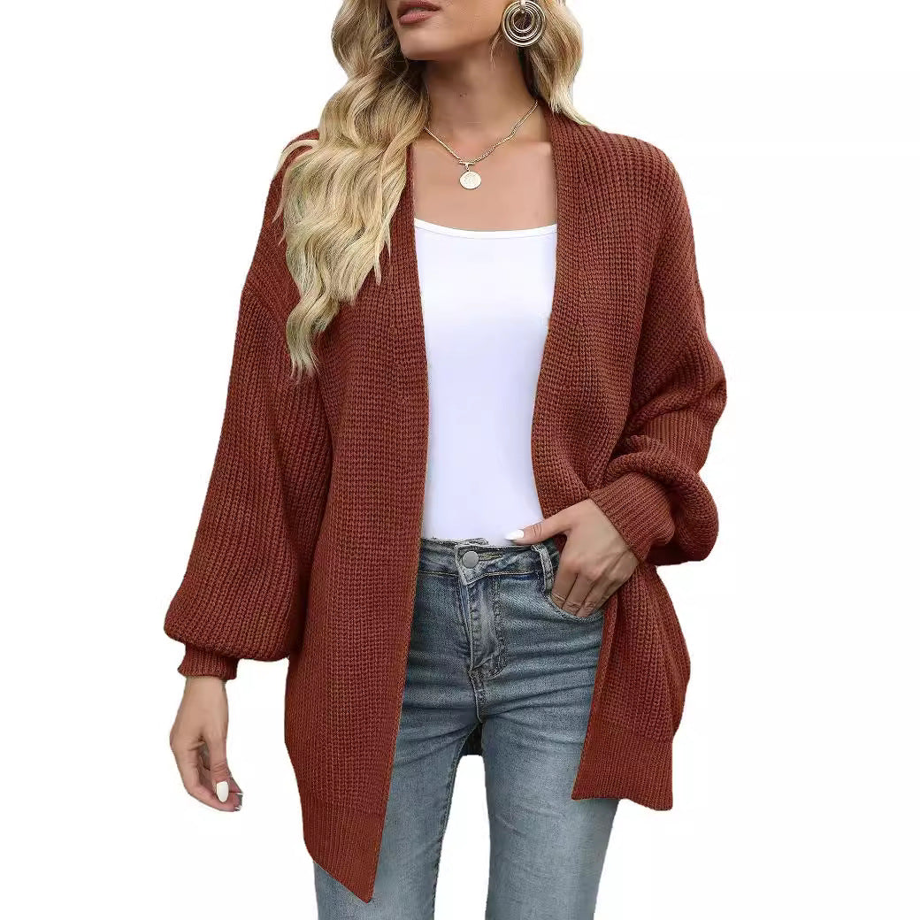 Cardigan autunnale/invernale donna oversize caldo. Maniche a lanterna, stile casual ed elegante.