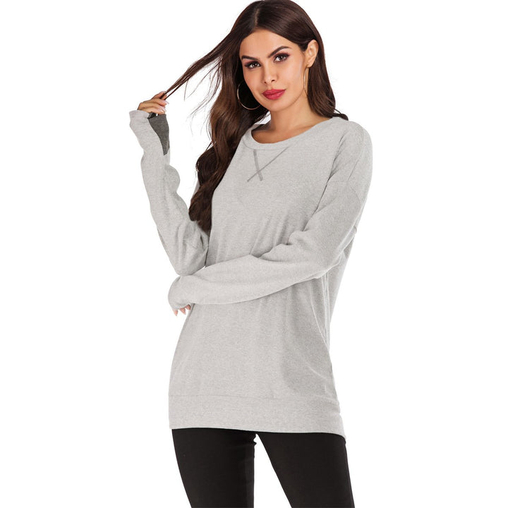 Maglione donna a maniche lunghe, tinta unita, scollo rotondo per stile e comfort.