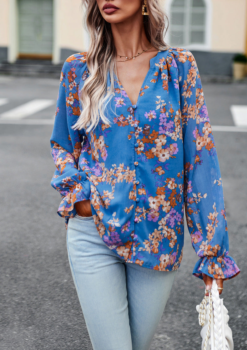 Blusa floreale autunnale da donna, stile peasant, con scollo a V e maniche lunghe. Top moda versatile.