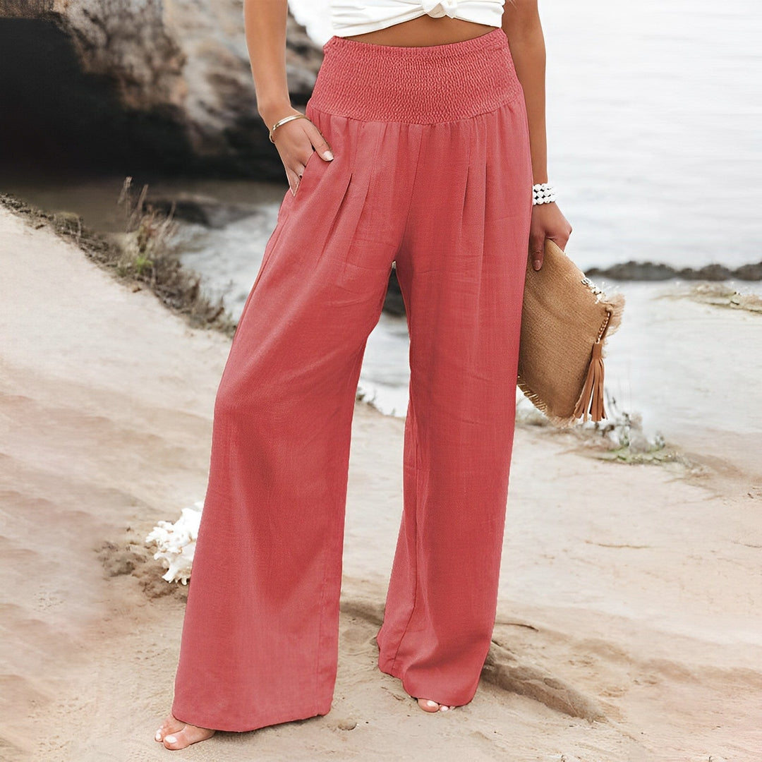 Scegli i pantaloni palazzo estivi a vita alta per donna, larghi e fluidi, la tendenza moda della stagione.