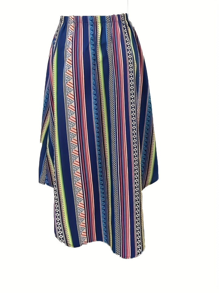 Gonna midi donna asimmetrica, fluida e con fantasia geometrica. Abbigliamento casual chic per la nuova collezione.