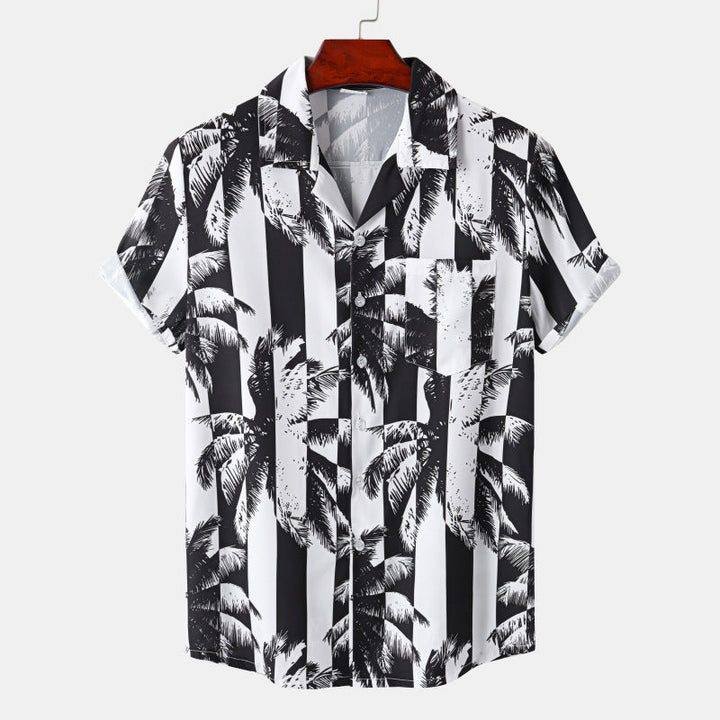 Camicia uomo nera a maniche corte con stampa integrale, vestibilità ampia per moda casual e stile estivo rilassato.