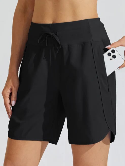 Design moderno di shorts sportivi donna vita alta con cordino, aggiungendo un tocco di stile al tuo outfit.