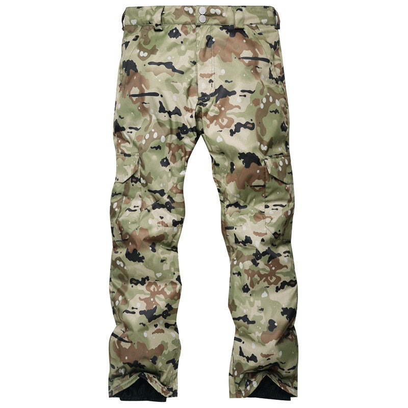 Pantaloni da sci uomo, vista laterale che mostra la vestibilità ampia, ideali per sci e snowboard sulla neve.