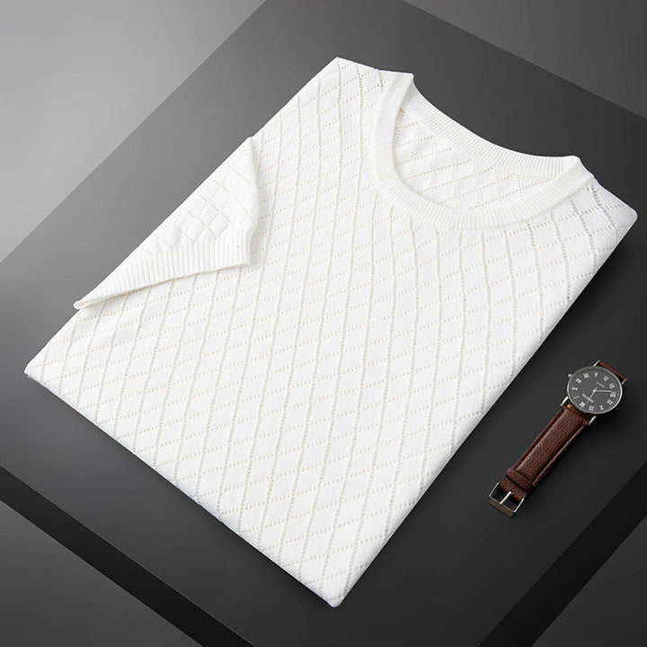 Camicia uomo a maniche corte a quadri. Tessuto antipiega per comfort e stile. Perfetta per la moda uomo casual-elegante estiva.