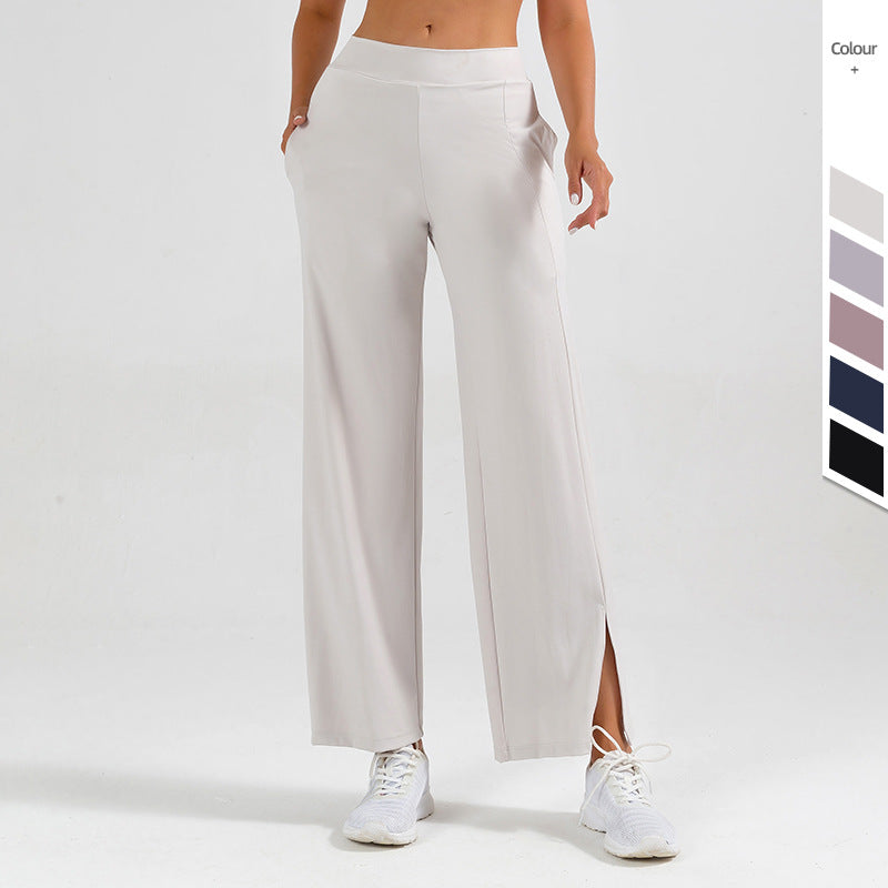 Eleganti pantaloni a zampa d'elefante da donna con spacco laterale per yoga, fitness o abbigliamento casual chic.