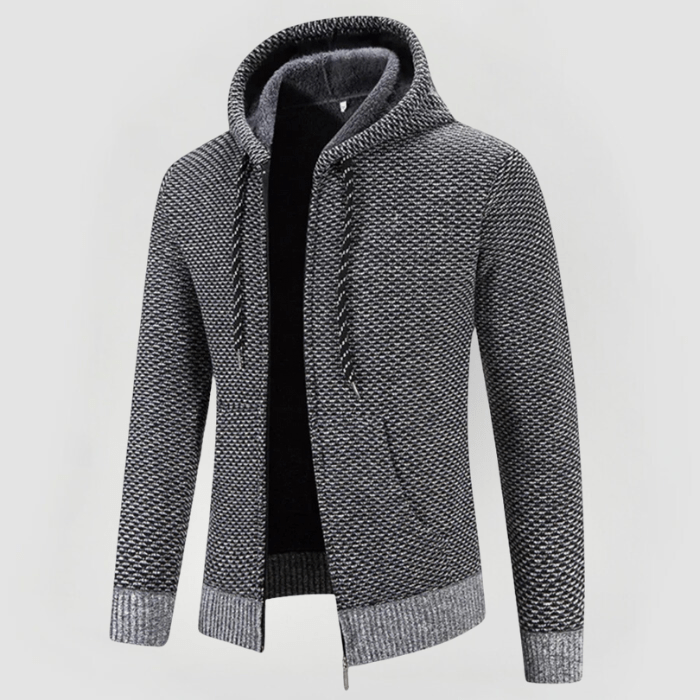 Primo piano: cerniera e cappuccio della felpa unisex autunnale, unisce stile e praticità.