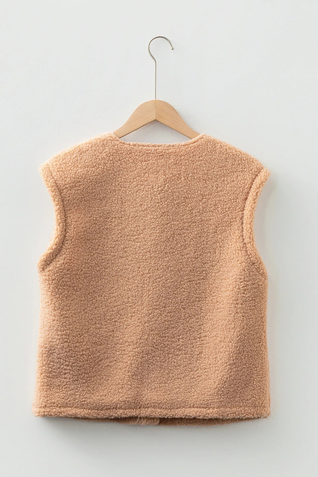 Gilet donna teddy beige con bottoni, senza maniche. Ideale per strati aggiuntivi e stile versatile.