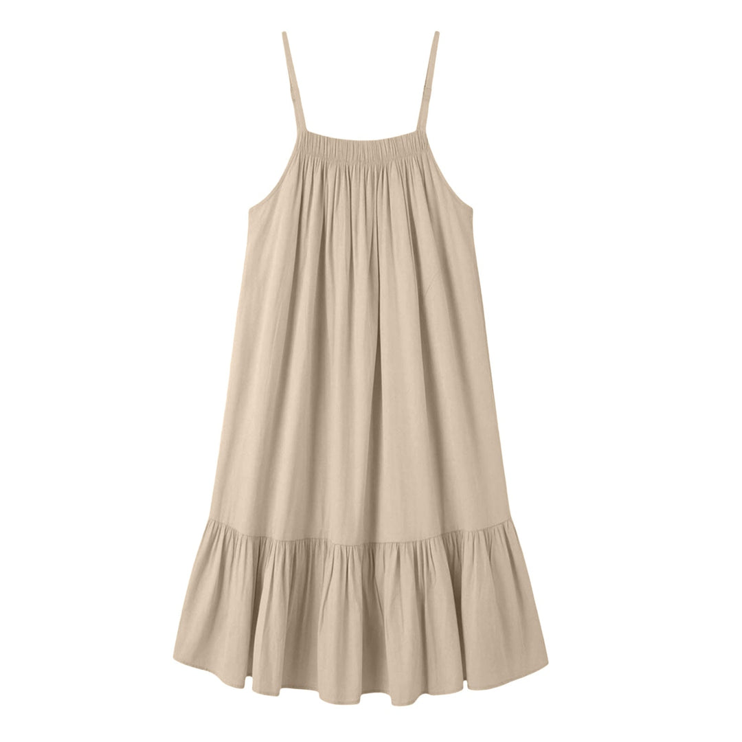 Abito estivo donna in tessuto fluido con spalline sottili, look fresco e trendy per l'estate.