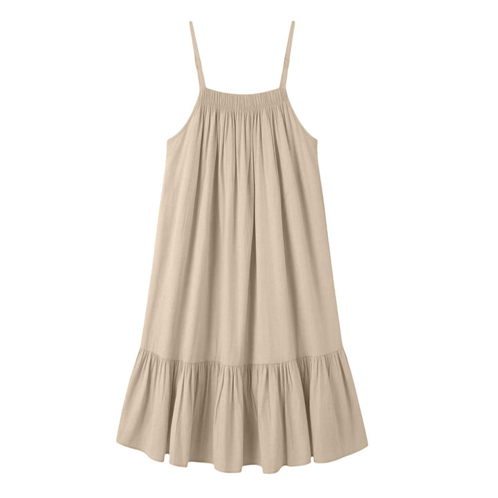 Abito estivo donna in tessuto fluido con spalline sottili, look fresco e trendy per l'estate.