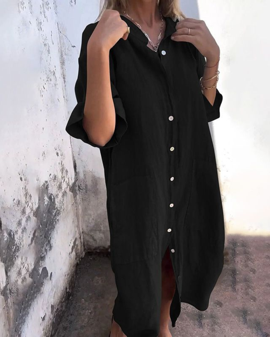Moda donna: abito midi nero casual-elegante, vestibilità ampia e confortevole, perfetto per l'estate.
