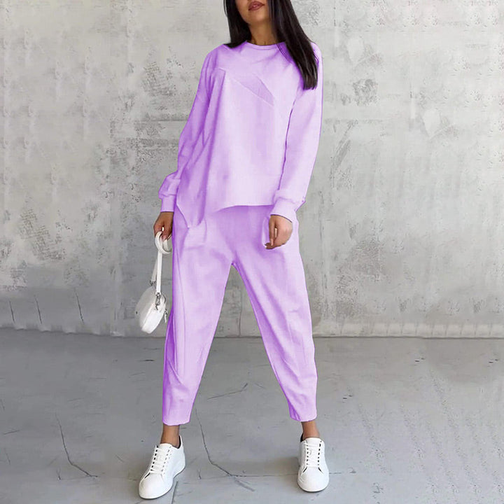 Completo donna comodo con felpa asimmetrica dal design unico e pantaloni casual. Ideale per la vita di tutti i giorni.