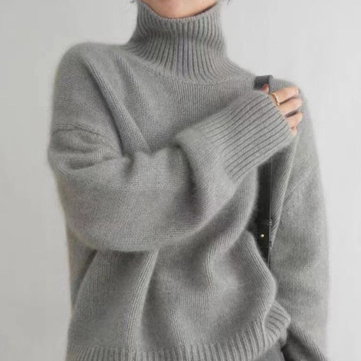 Maglione dolcevita spesso donna grigio, pullover caldo e comodo per l'inverno. Comfort per ogni giorno.