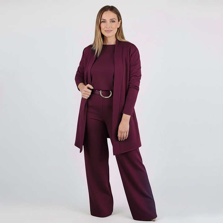 Set coordinato donna tre pezzi con cardigan lungo, ideale per uno stile ufficio o comfort quotidiano.