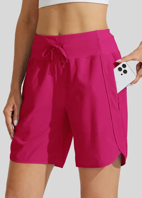 Shorts fitness donna vita alta con cordino, essenziali per ogni allenamento, garantendo supporto e stile.