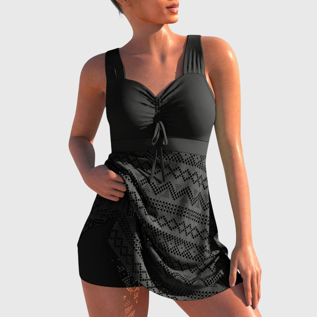 Costume tankini donna con gonna, shorty integrato e vita alta per un effetto modellante sulla figura.