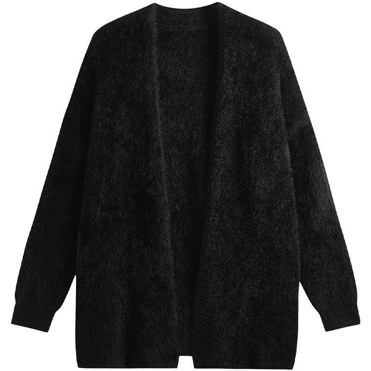 Versatile cardigan donna lungo. Stile quotidiano comodo e alla moda per autunno inverno. Abbigliamento femminile.