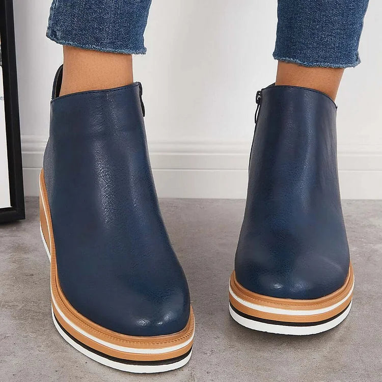 Stivali eleganti donna in suede nero, comodi e versatili per outfit autunnali e invernali.