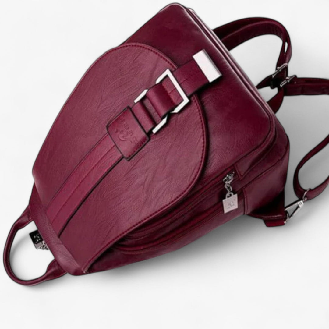 Zaino casual da donna, design multicolore e pratico con patta regolabile.