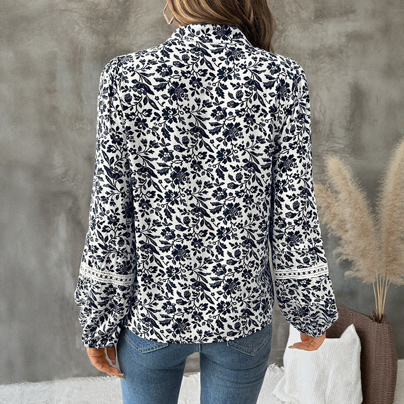 Camicia donna a V, pullover con stampa floreale, maniche a lanterna. Un must-have della moda femminile.