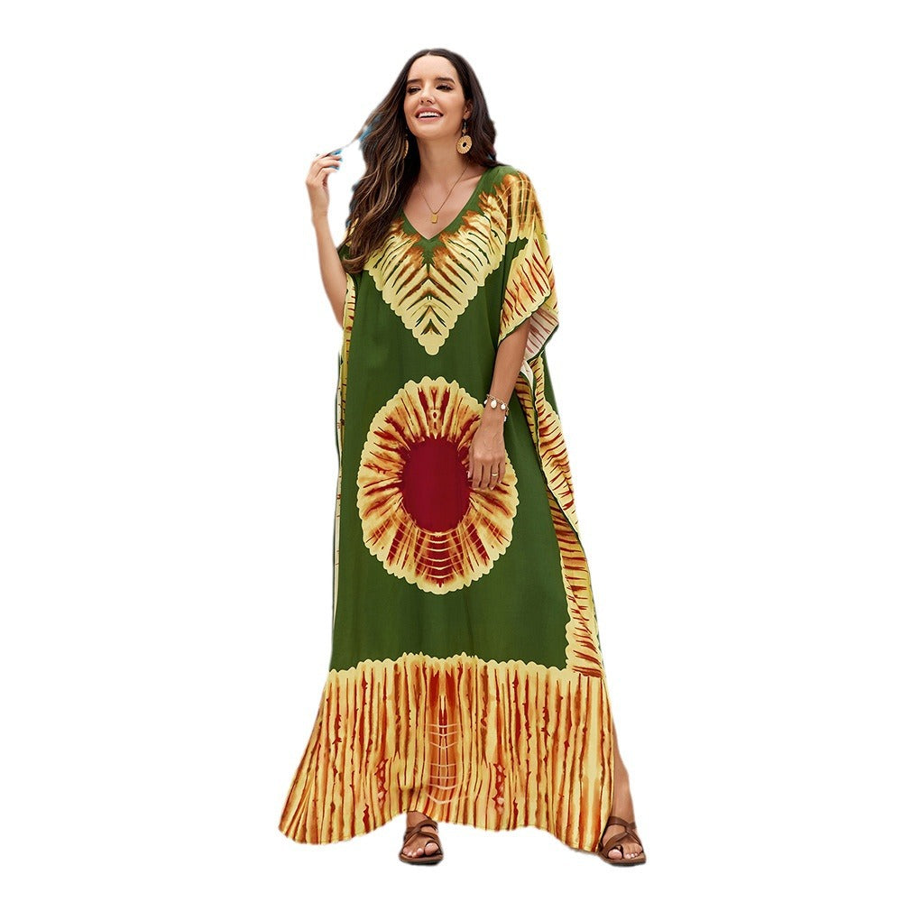 Abito estivo lungo e fluido per donna, a fantasia colorata, con elegante scollo a V.