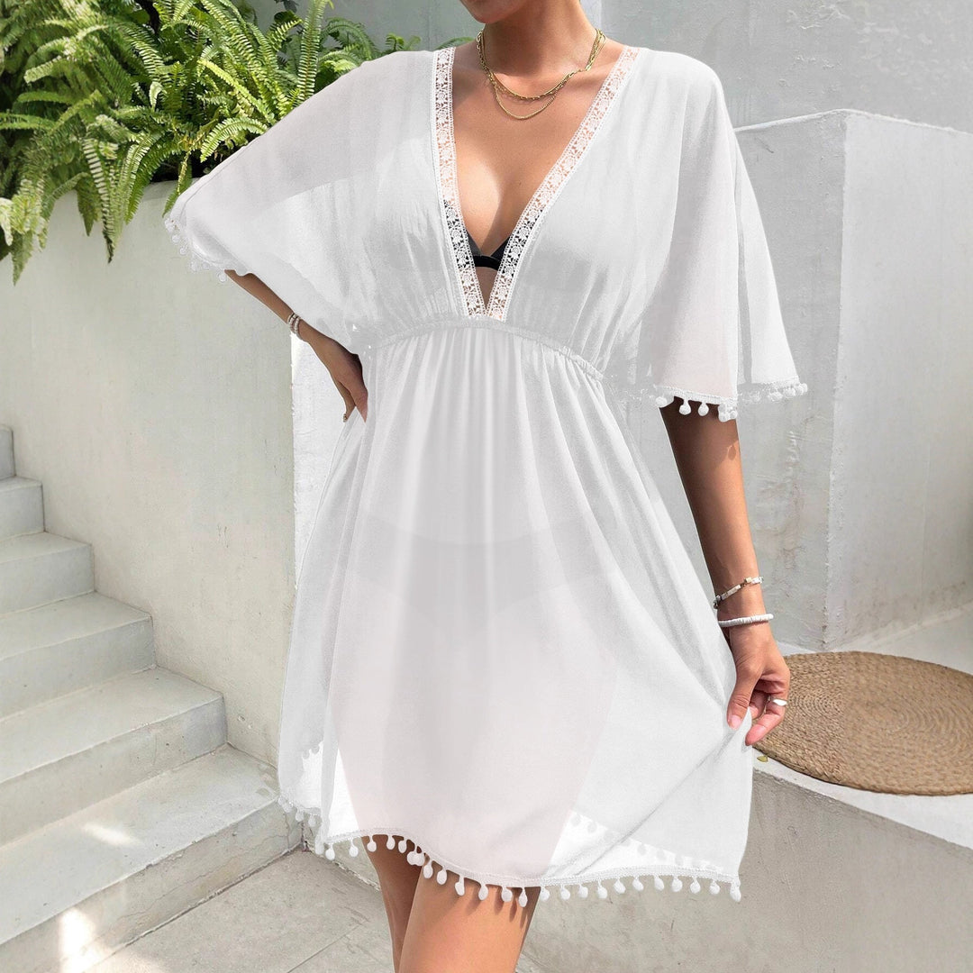 Abito da spiaggia donna casual chic con pizzo patchwork e profondo scollo a V. Dotato di pratica cintura in vita.