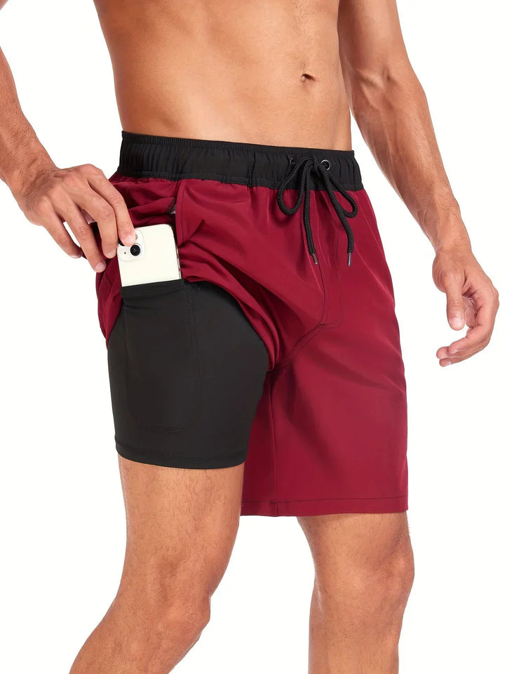 Pantaloncini sportivi uomo neri ad asciugatura rapida, ideali per nuoto e allenamento. Comfort e performance garantiti.