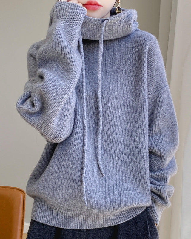 Maglione donna con elegante colletto Peter Pan e maniche lunghe, perfetto per moda femminile autunno inverno.