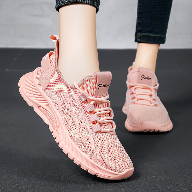Calzature sportive donna bianche con lacci, comfort elevato per corsa e passeggio. Stile versatile.