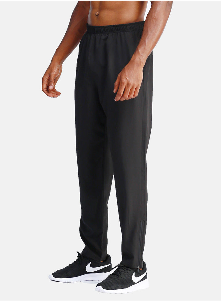 Pantaloni sportivi uomo traspiranti, ad asciugatura rapida, ideali per basket, corsa e allenamento. Tessuto leggero.