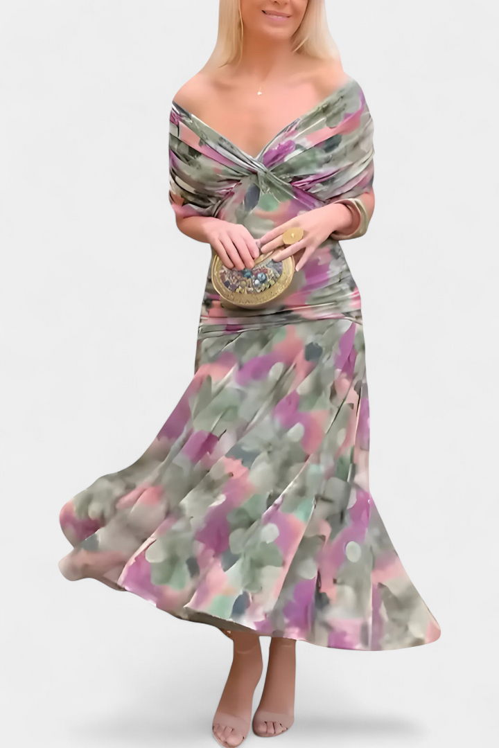 Abito floreale donna con scollo a V, lunghezza maxi. Perfetto per un look fluido e romantico estivo.