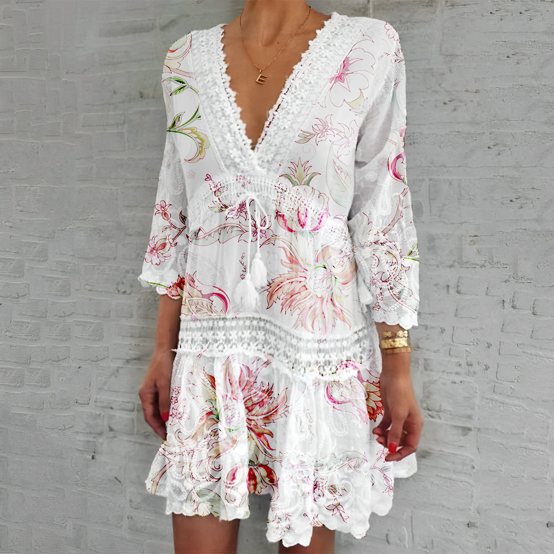 Mini abito da donna floreale con scollo a V, stile estivo elegante e casual. Perfetto per ogni occasione.