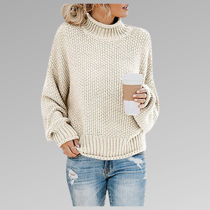 Maglione oversize donna dolcevita per comfort avvolgente. Pullover caldo a maniche lunghe, stile rilassato invernale.