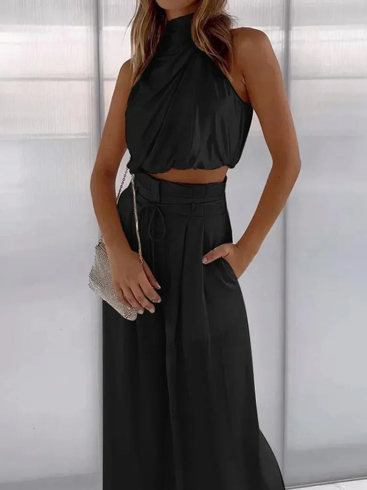 Abbigliamento donna estivo: coordinato versatile crop top e pantaloni palazzo, comodo per viaggi o tempo libero.