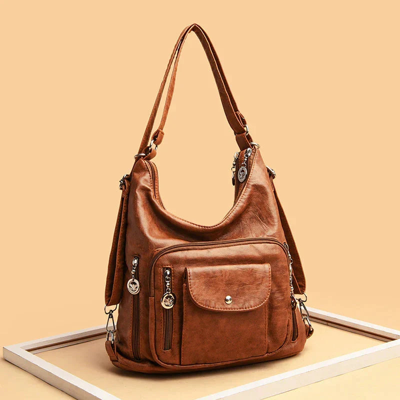 Borsa casual a tracolla in pelle per donna, design multitasche e comfort per il tuo viaggio quotidiano.
