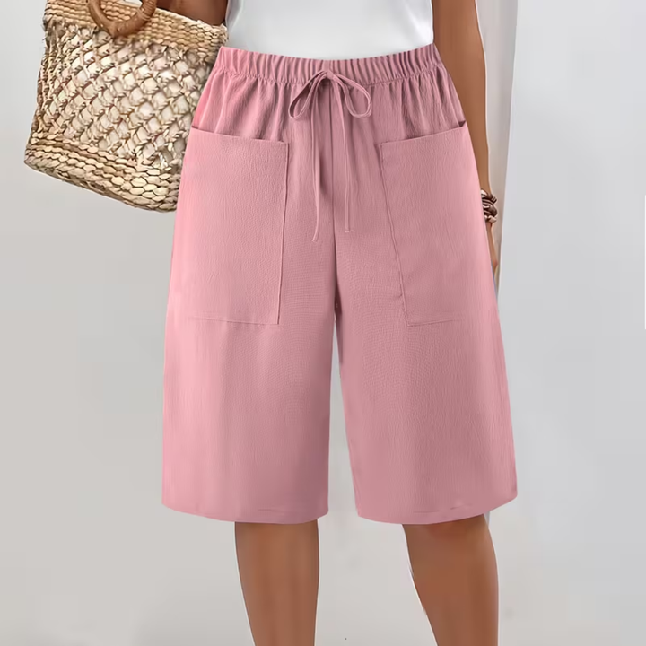 Pantaloni bermuda donna, shorts estivi ideali per un look rilassato. Vita elastica e tasche per massima praticità.