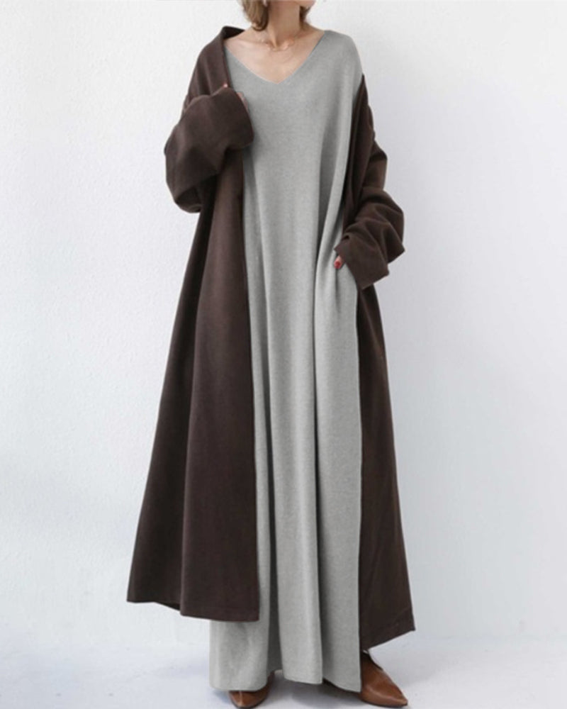 Abito lungo verde da donna in cotone. Design a maniche lunghe e girocollo, ideale per un look casual.