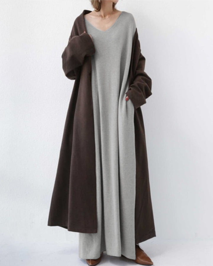 Abito lungo verde da donna in cotone. Design a maniche lunghe e girocollo, ideale per un look casual.