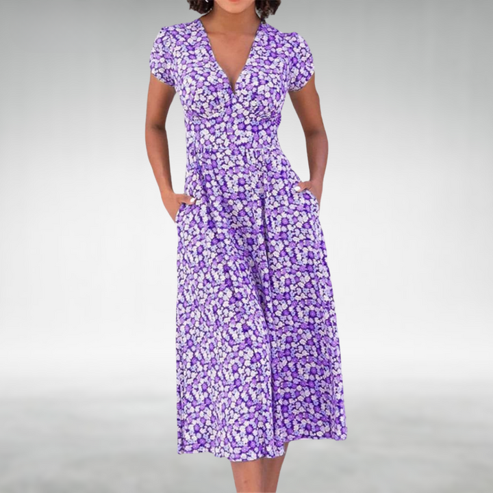 Vestito donna estivo, design versatile con scollo V. Un capo elegante per la spiaggia e serate di vacanza.