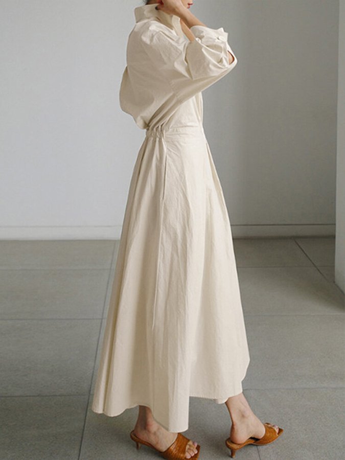 Abito chemisier maxi da donna elegante, con cintura regolabile e colletto classico, perfetto per look casual o serali.
