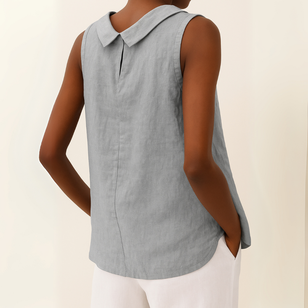 Blusa donna estiva con collo alto, tessuto leggero e design senza maniche, ideale per la moda estate.