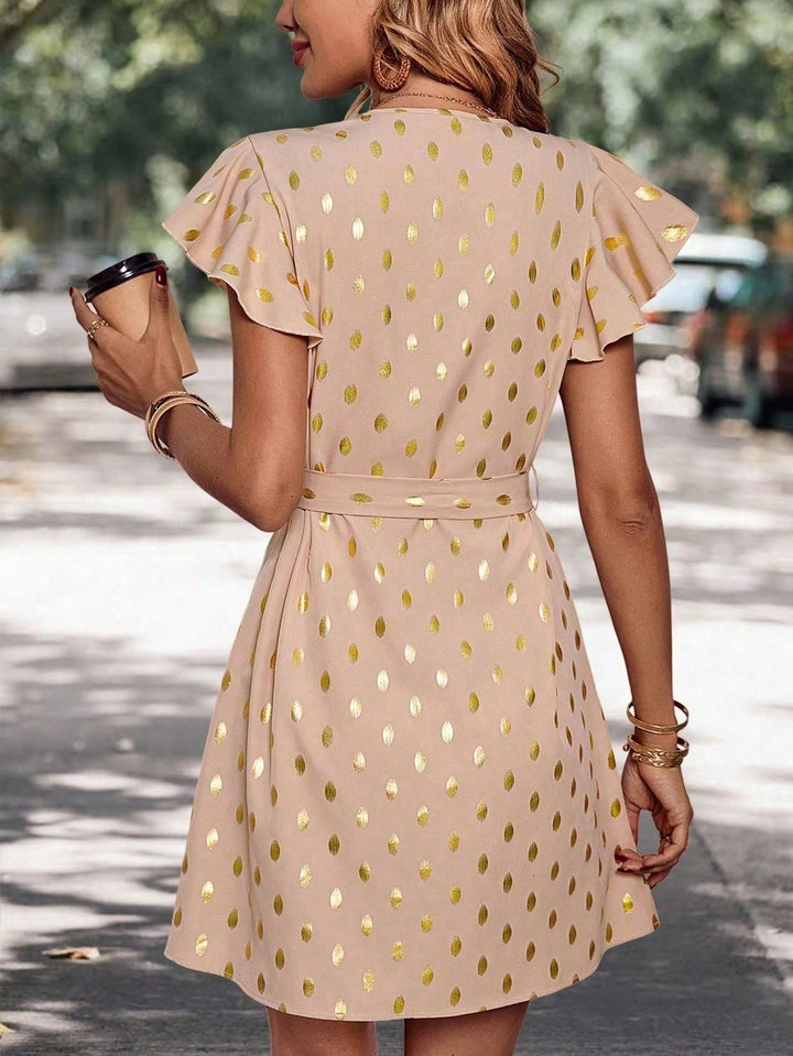 Abito estivo donna midi elegante con fantasia a pois, vita alta e linea ad A. Un capo primaverile must-have.