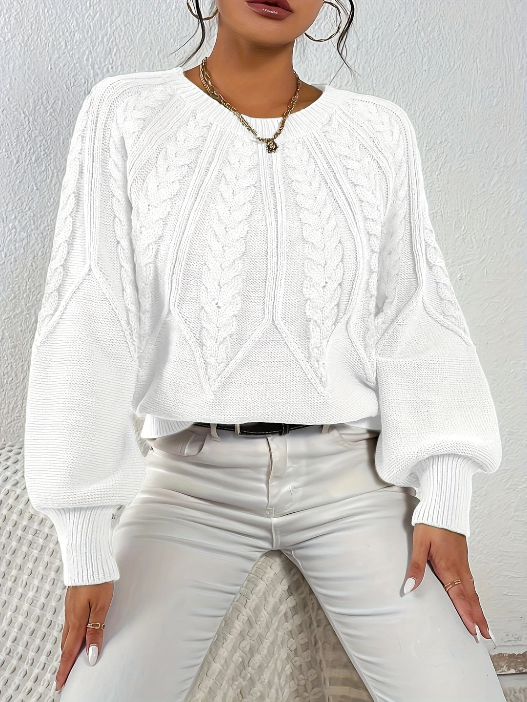 Moda donna: maglione a trecce, maniche a palloncino. Un capo versatile per il tuo guardaroba.