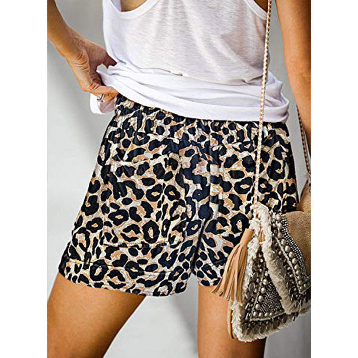 Pantaloncini donna comodi vita alta gamba larga, essenziali per outfit estivi casual e rilassati.