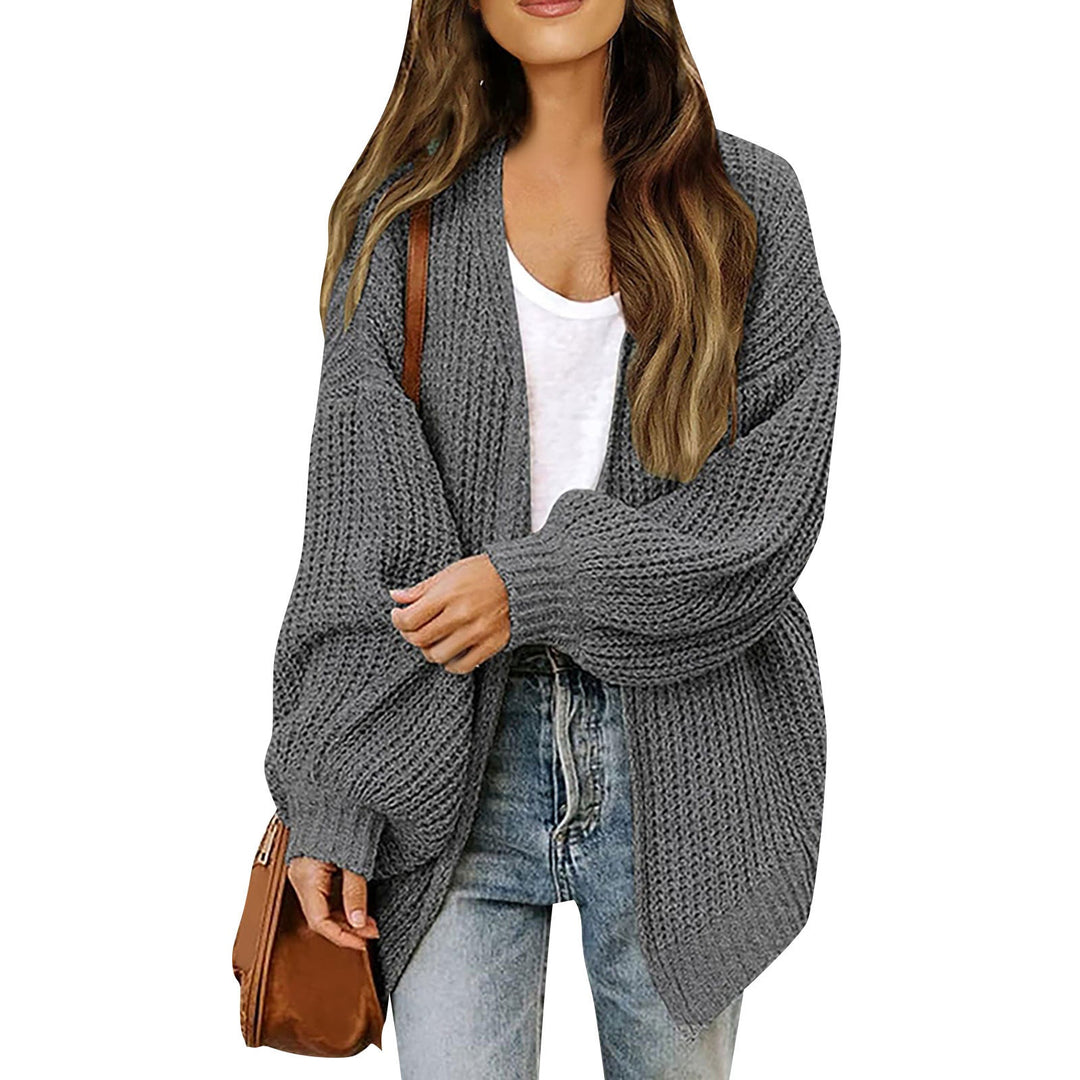 Cardigan donna invernale essenziale, oversize, caldo. Maniche a lanterna, look comodo ed elegante.