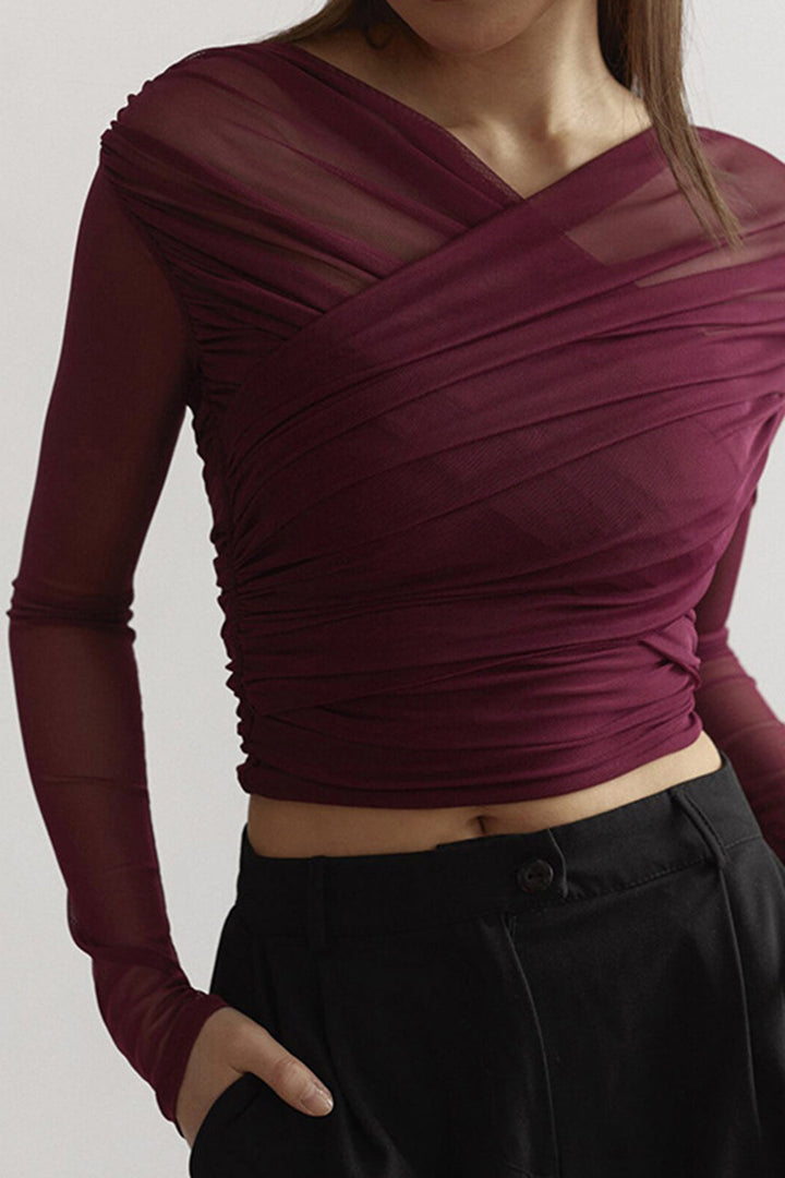 Camicetta drappeggiata da donna, elegante blusa a maniche lunghe con scollo a V. Perfetta per ufficio e serate.