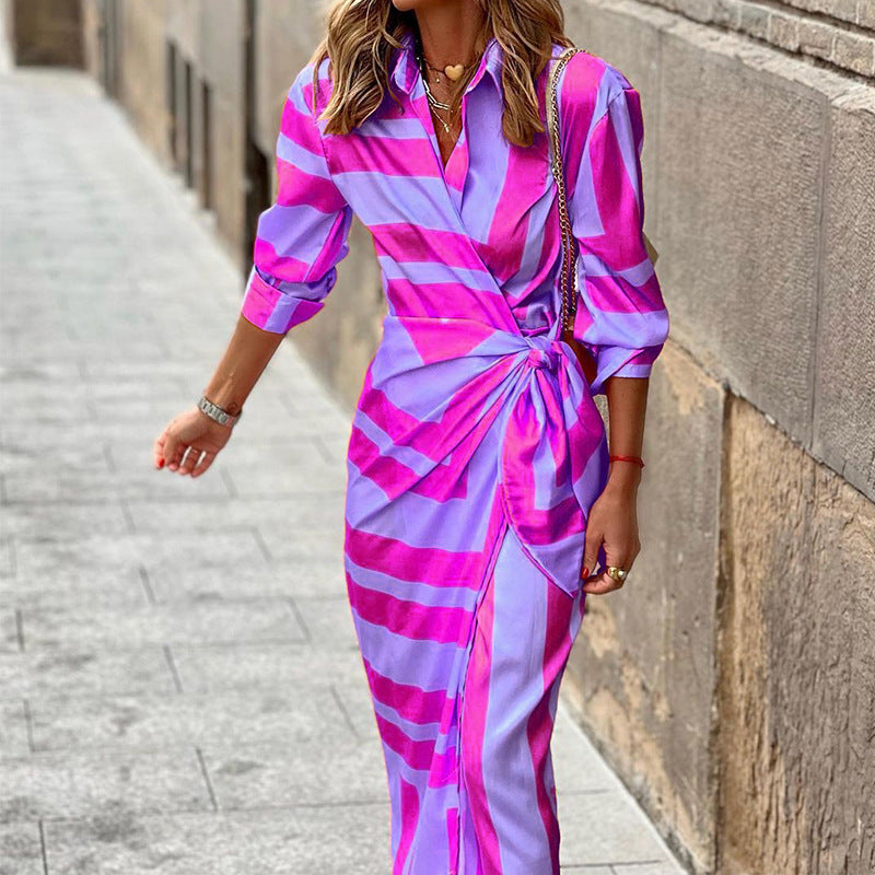 Abito donna primaverile/estivo, parte superiore cardigan a righe con lacci, inferiore gonna dritta fantasia in viola, arancione, verde.