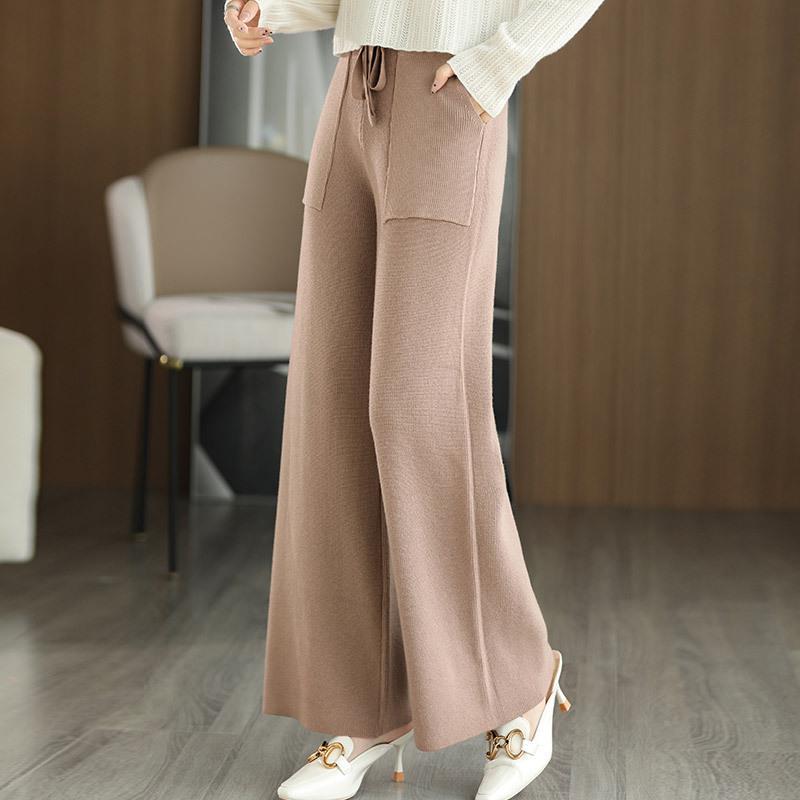 Dichiarazione di stile: pantaloni donna a vita alta e gamba larga, perfetti per un look fashion in ogni stagione.